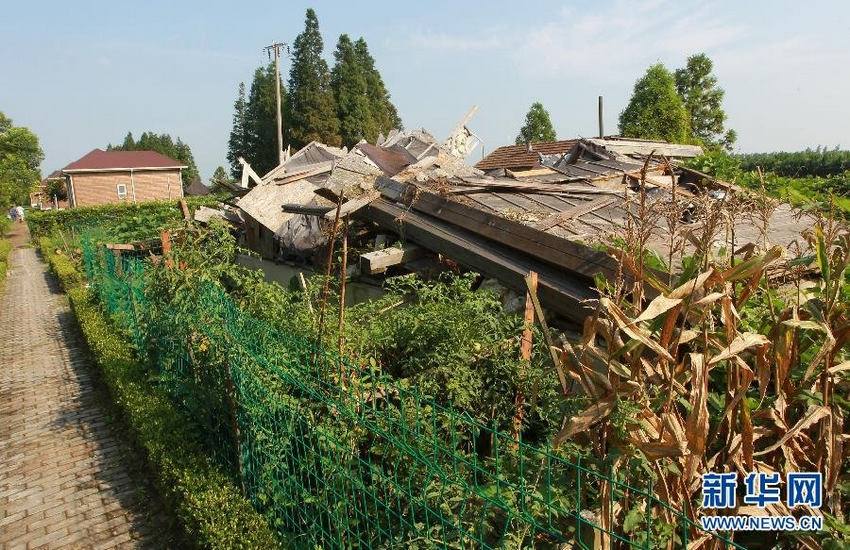 这是2013年一栋违建别墅拆除后留下的废墟（8月5日摄）。裴鑫 摄