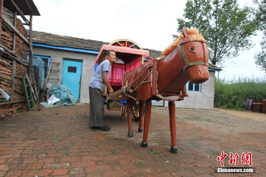 吉林农民自制电动“木牛流马”